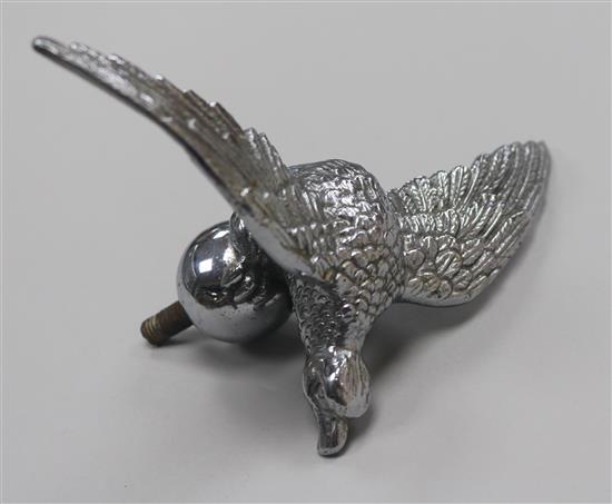 A chrome plated eagle and globe car mascot, stamped Desmo